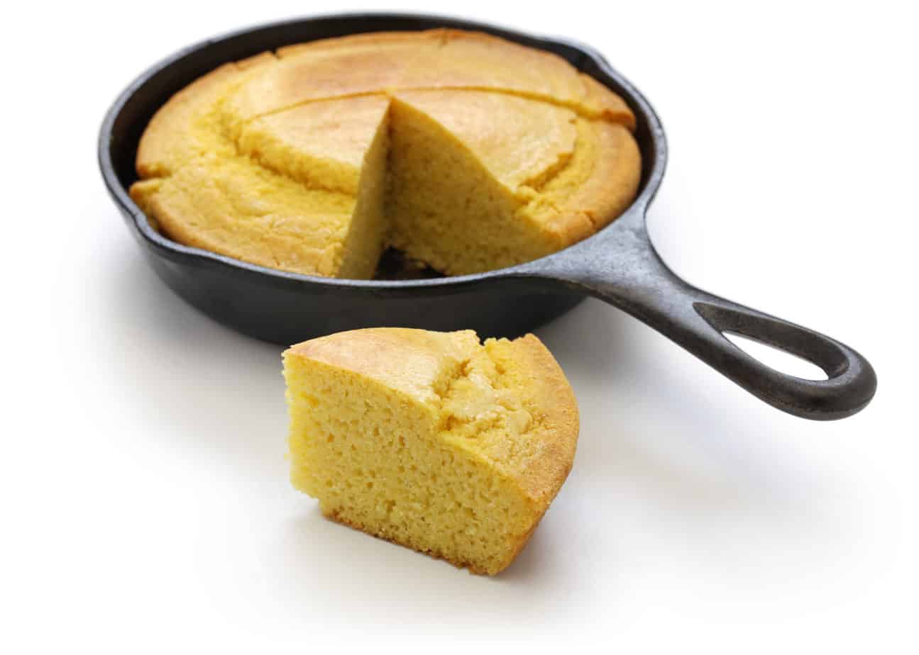 Wedge of skillet cornbread for serving