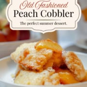 Old-fashioned peach cobbler with a golden cobbler topping in a white bowl. Text reads: Old-Fashioned Peach Cobbler, the perfect summer dessert.