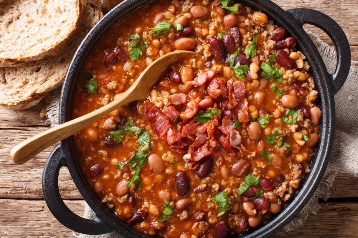 Top view of Slow Cooker Turkey Chili with turkey bacon and parsley