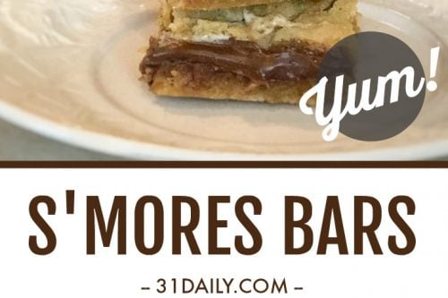 A stack of gooey S'mores Cookie Bars sits on a white plate, featuring irresistible marshmallow and chocolate layers. Text overlay reads "Yum!" Below, more delectable bars rest on a parchment-lined tray with the text "S'MORES BARS - 31daily.com.