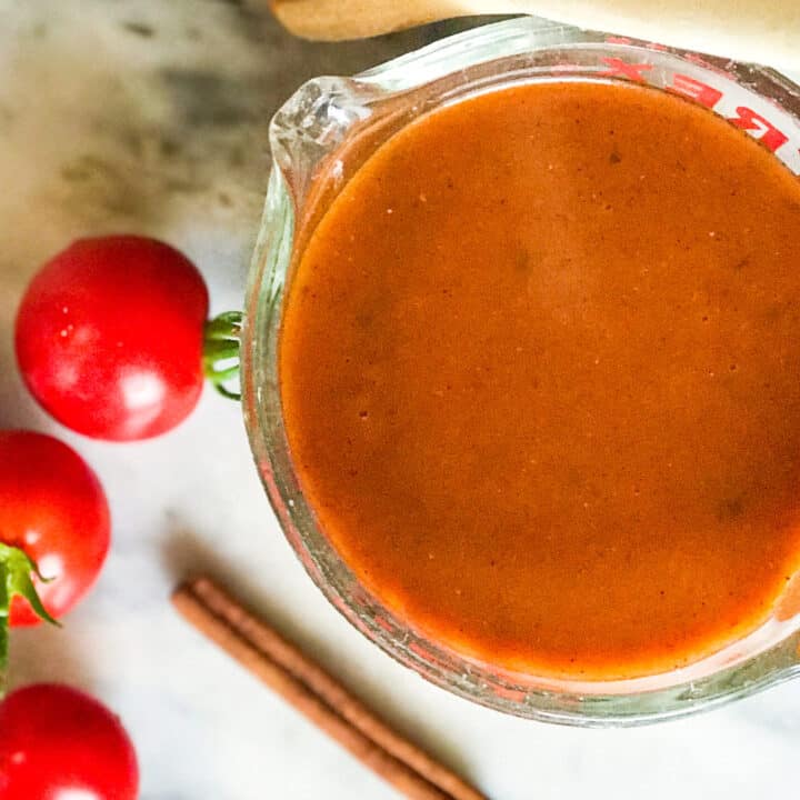 Top view of Homemade Enchilada Sauce in a Glass Measure