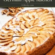 Single-image poster of German Apple Kuchen — a golden, old-fashioned apple cake with thinly sliced apples and cinnamon-sugar topping, styled on a rustic surface. URL: 31Daily.com