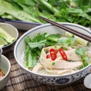 bowl of chicken pho with chop sticks