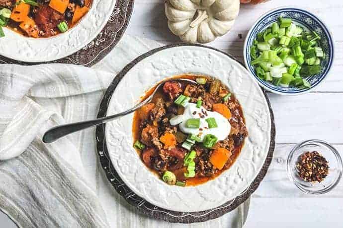Bowl of Butternut Squash Beef Chili in a White Bowl