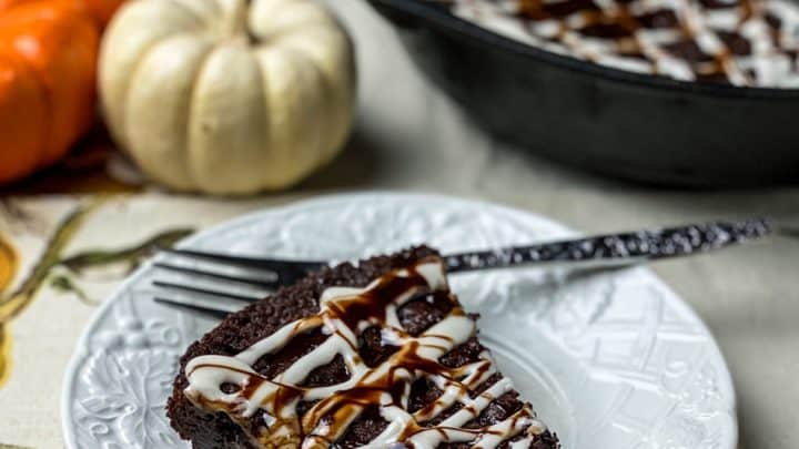slice of a chocolate skillet brownie with maple glaze
