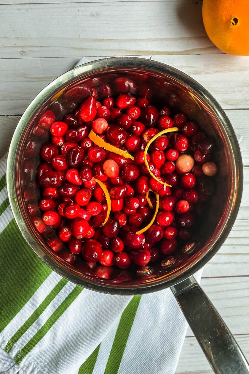 overhead view of fresh cranberries in a saucepan