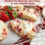 Single image poster of golden buttermilk strawberry scones drizzled with lemon butter glaze, styled on a white surface with fresh strawberries.