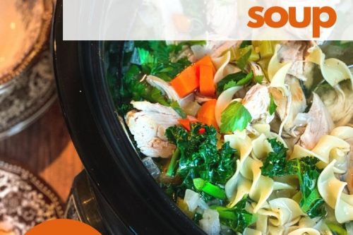 A slow cooker filled with hearty slow cooker chicken noodle soup—packed with noodles, chicken, carrots, and greens—with a promotional text overlay about the recipe.