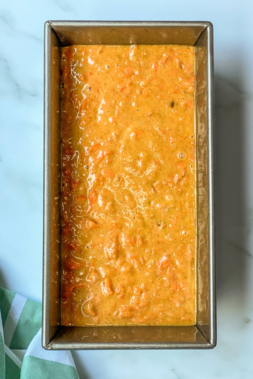 unbaked carrot cake loaf in pan