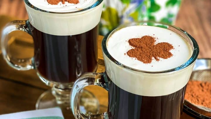 Mugs of Non Alcoholic Irish Coffee on a Wood Board with Shamrock Stencil