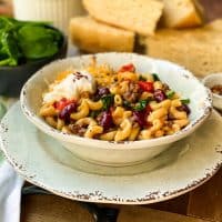 side view of Instant Pot Chili Mac and Cheese in White Bowl