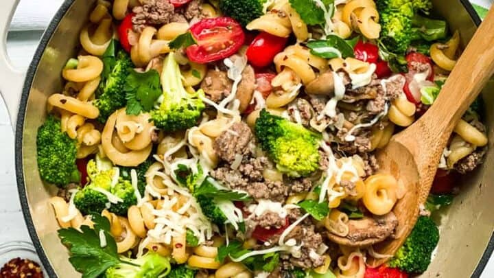 Top view of Easy One Pot Pasta with Ground Beef and Broccoli with a Wooden Spoon
