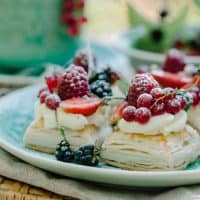 Closeup of Berry Puff Pastry Tarts on an Aquas Plate