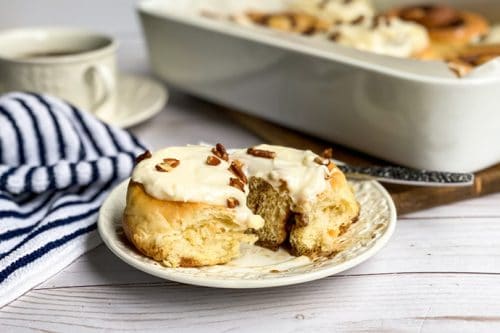 Homemade Cinnamon Roll on a White Plate