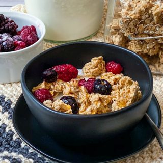 Peanut Butter Granola Clusters in a Black Breakfast Bowl