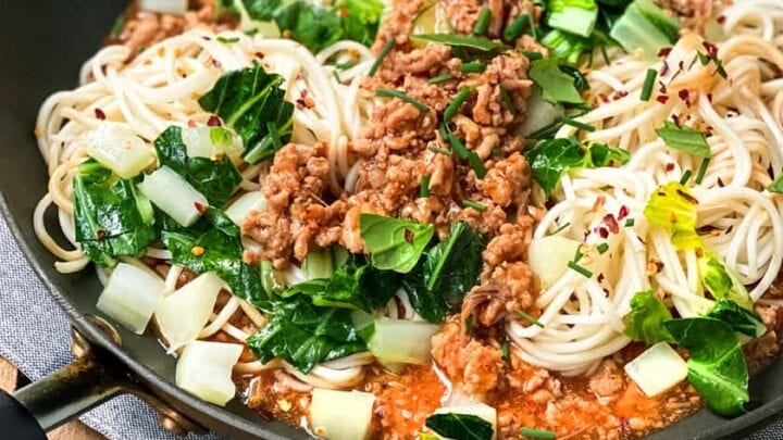 Ginger Pork Noodles with Bok Choy in a Black Skillet