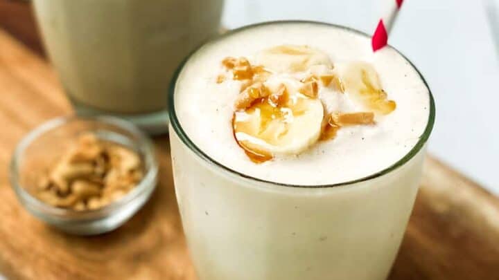 Two glasses of Peanut Butter Banana Smoothie