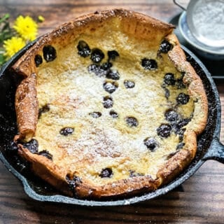 Blueberry Dutch Baby Oven Pancake in a Cast Iron Skillet