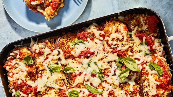 Eggplant Parmesan in a Dark Casserole Dish