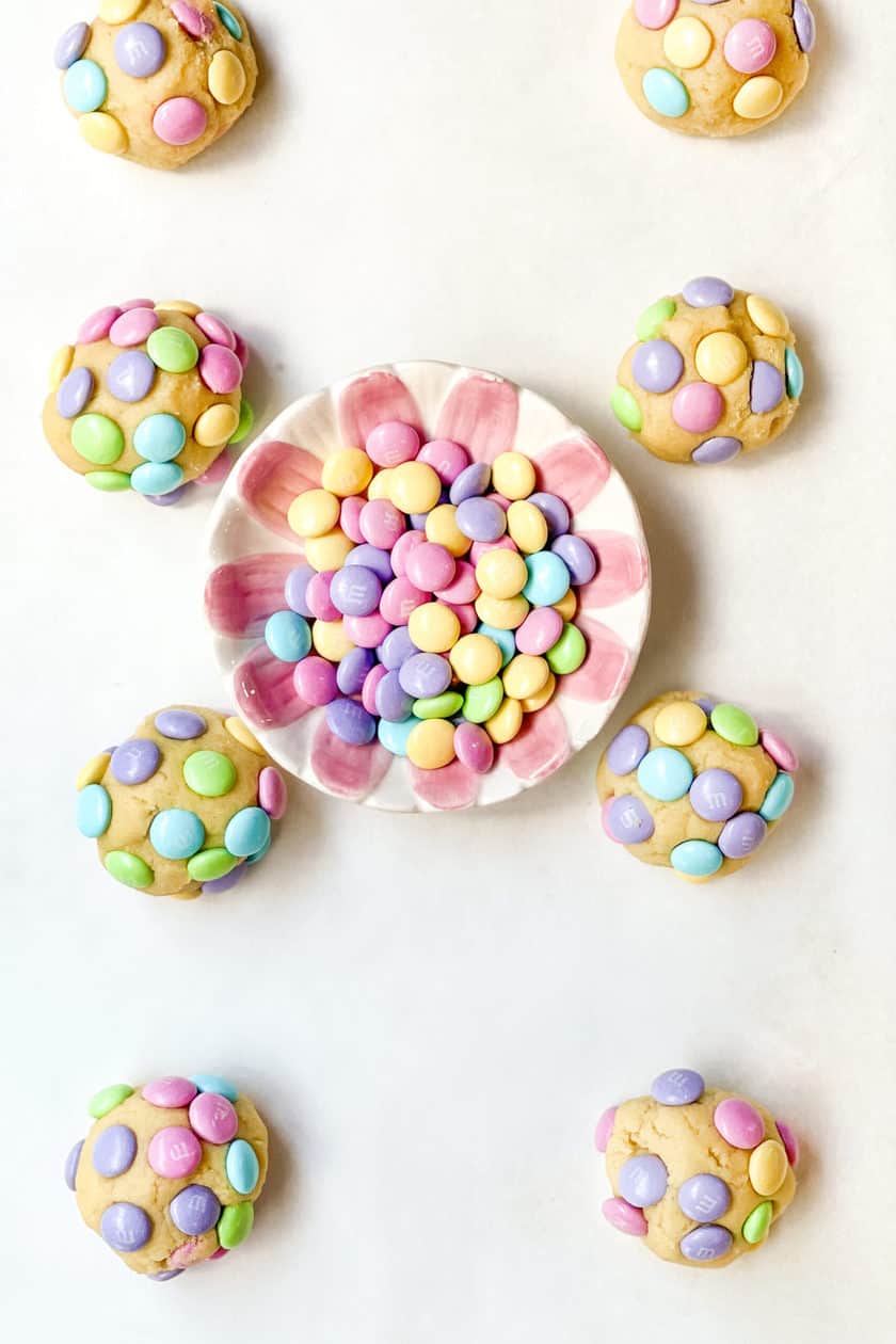 Unbaked Easter M&M Cookies on a Baking Sheet with Easter M&Ms