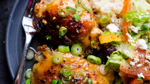 Slow Cooker Thai Chicken Thighs served over white rice.