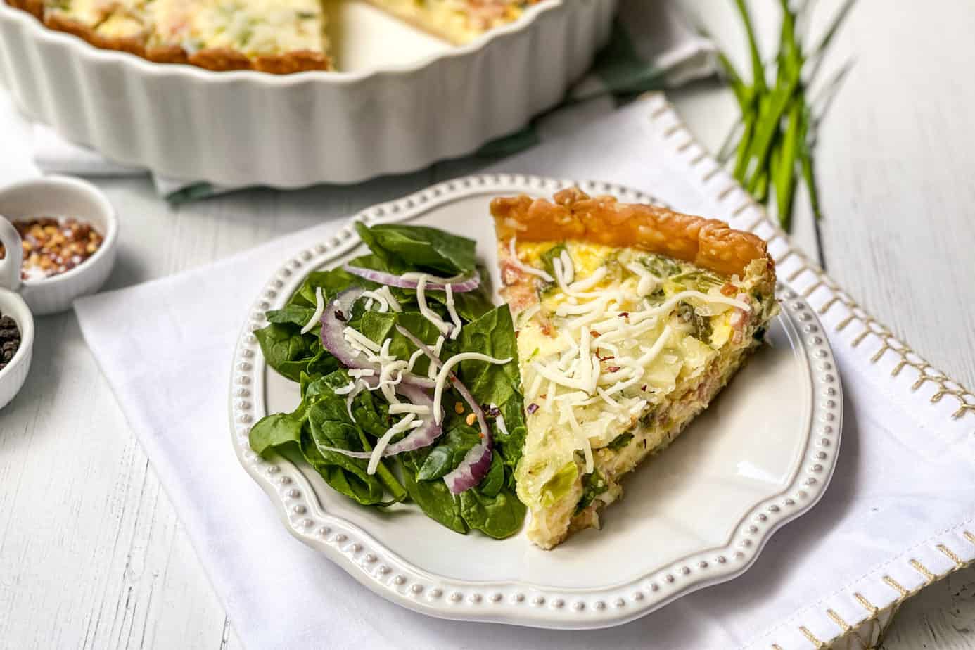 Horizontal view of a slice of Asparagus Quiche