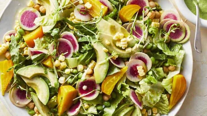 This gorgeous and healthy summer vegetable salad is loaded with pretty produce, including golden beets, avocado, corn, microgreens and radishes.