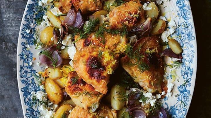 A teatime table for 2 in the garden with pink roses