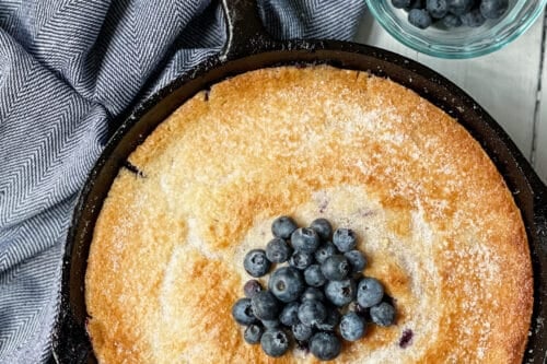 Top view of Blueberry Cobbler in black skillet