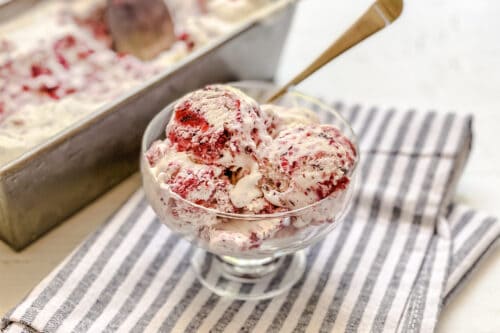 Berry No Churn Ice Cream in an Ice Cream Dish with Spoon