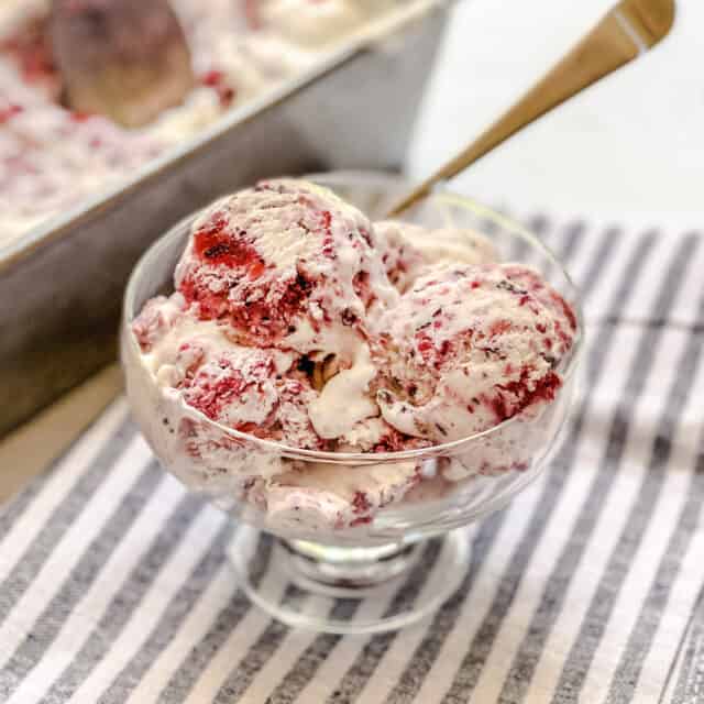 Berry No Churn Ice Cream in an Ice Cream Dish with Spoon