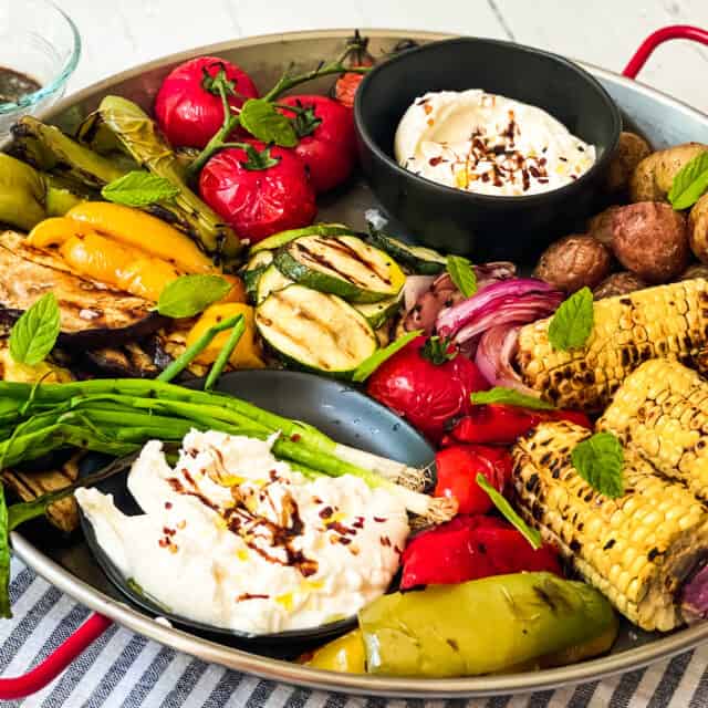 Grilled Vegetables with Burrata Cheese on a serving platter.