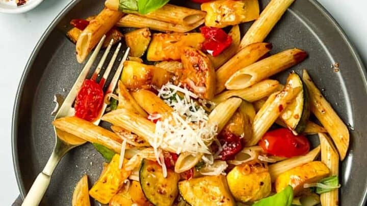 Zucchini Pasta with fork on dark grey plate