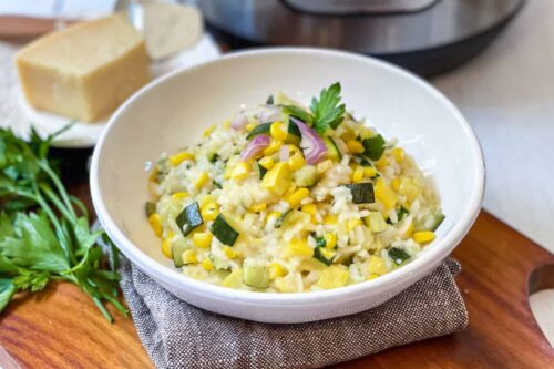 Instant Pot Risotto in a white pasta bowl