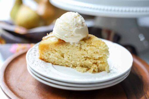Slice of Pear Upside Down Cake with Vanilla Ice Cream