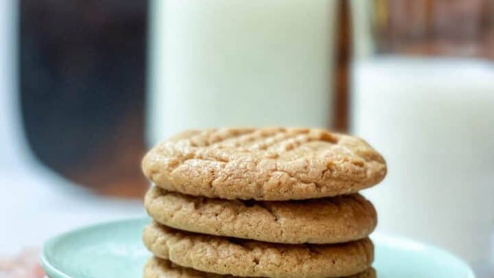 Vertical side view of 3 Ingredient Peanut Butter Cookies on a plate