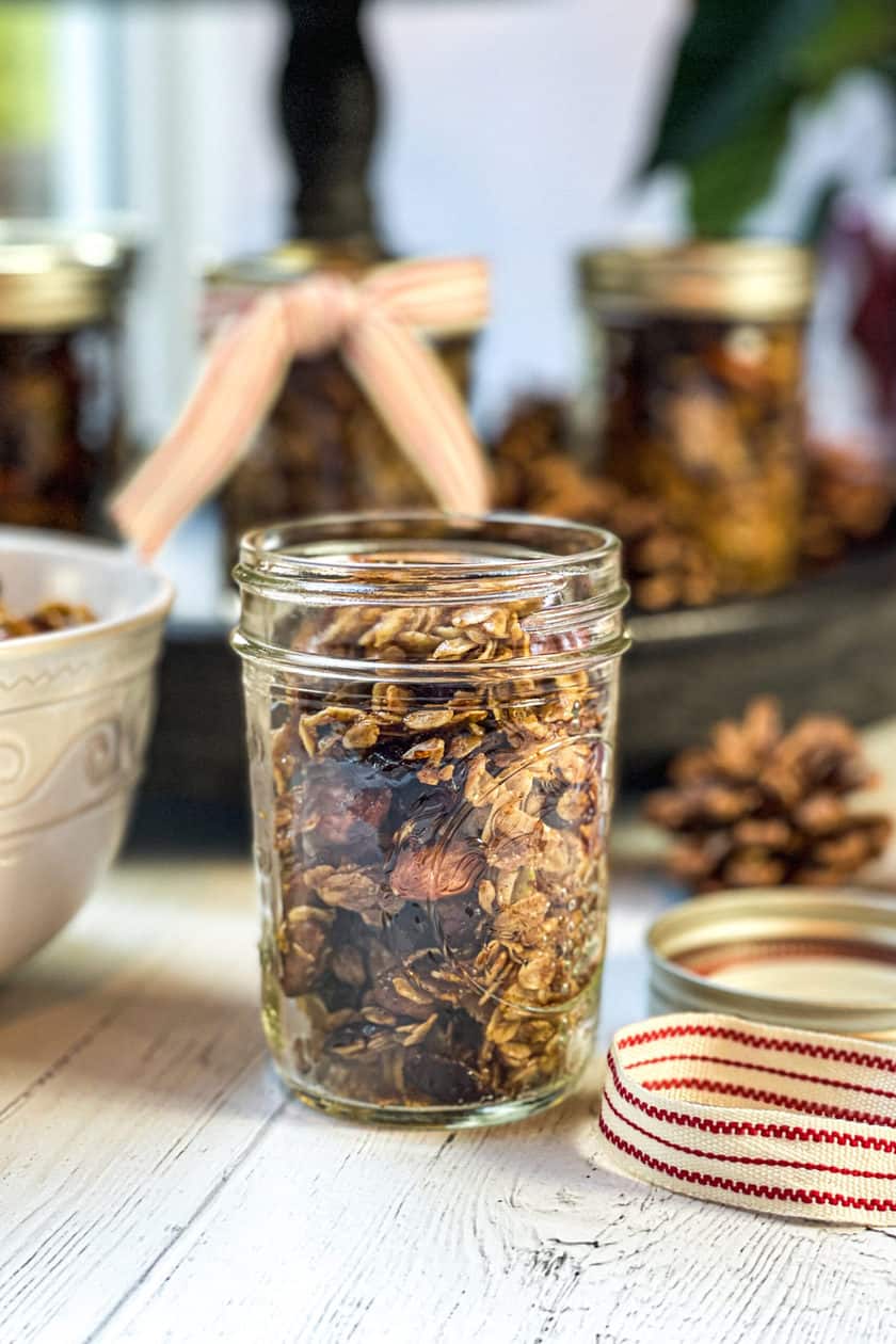 Closeup view of mason jar with Christmas Granola Recipe