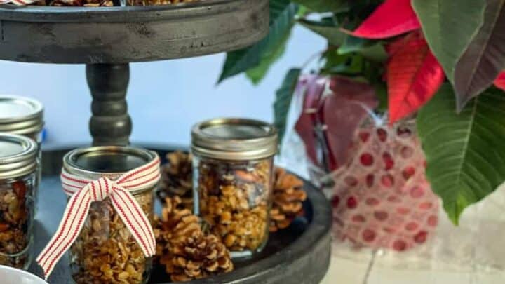 Jars of Christmas Granola with red and white ribbon