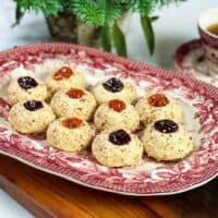 Thumbprint cookies on a red and white platter