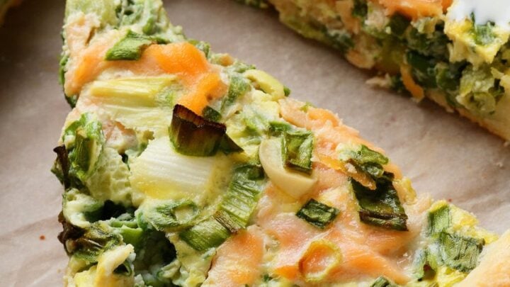 Closeup view of a wedge of salmon quiche