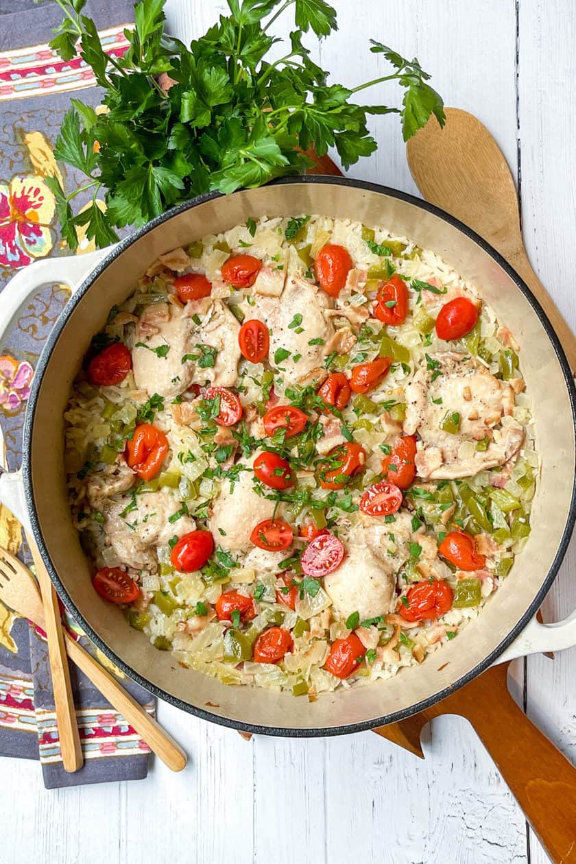 Top view of Chicken Perloo with tomatoes in a Pot