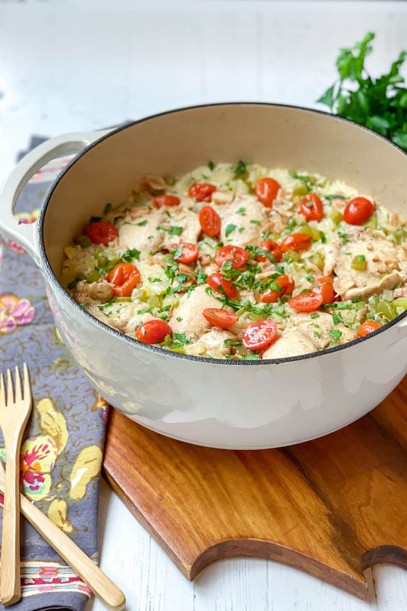 Side view of Chicken Perloo in a Cream Dutch Oven