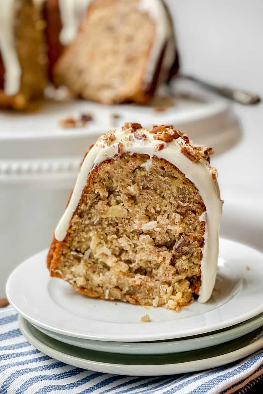 Slice of frosted Hummingbird Cake
