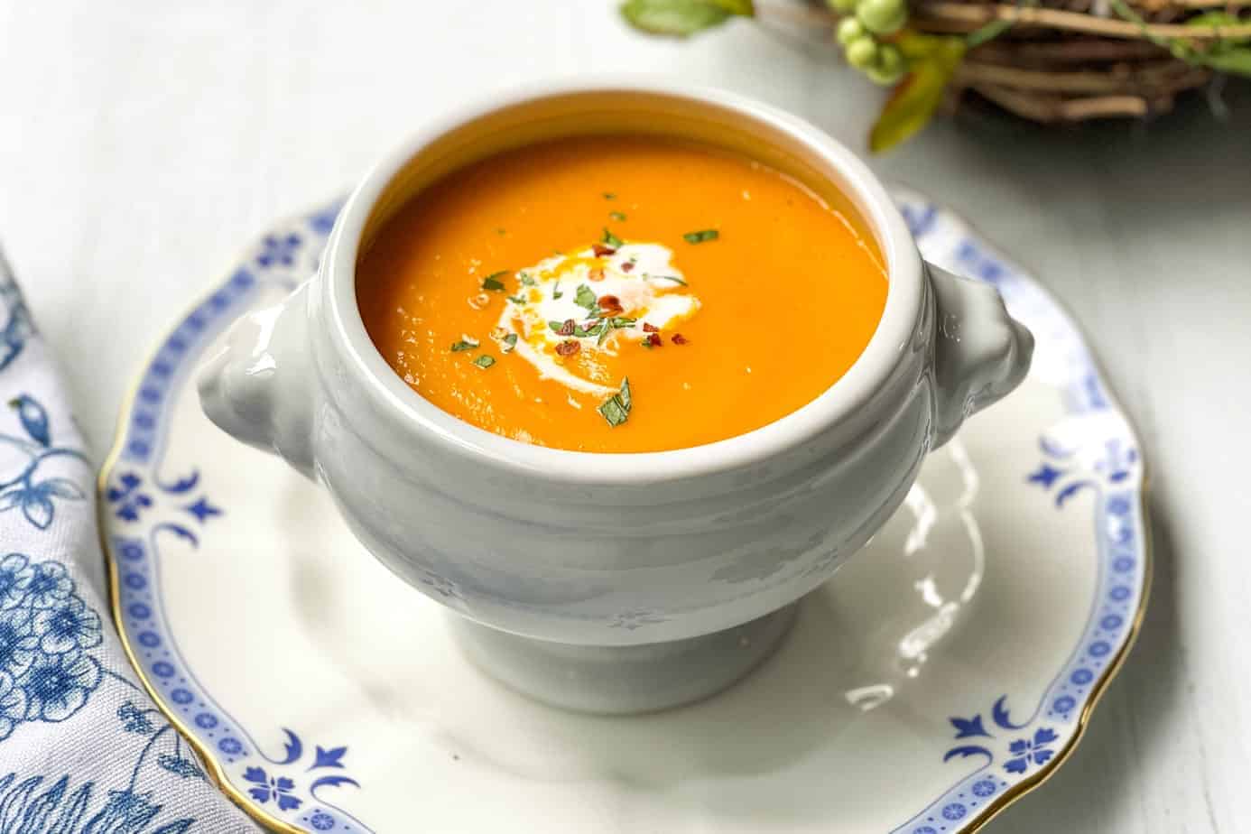Side view of Carrot Soup in Lion Head Bowl