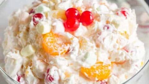 Vertical view of an Almond Cake slice with a bite missing