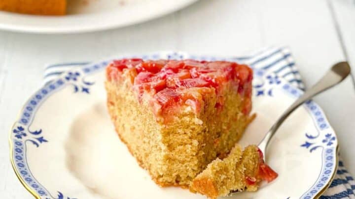 Slice of Rhubarb Upside Down Cake with a bite missing