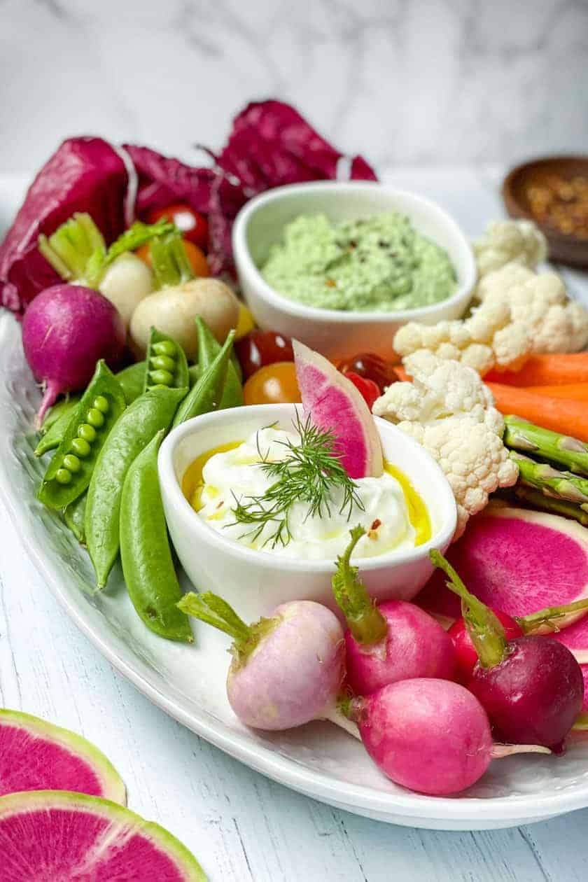 Side view of Easy Spring Crudites Platter with sliced watermelon radishes