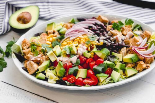 Horizontal view of Chicken Taco Salad on a white serving platter
