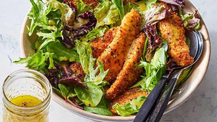 Homemade Chicken Tenders on a bed of lettuce for low carb dinners