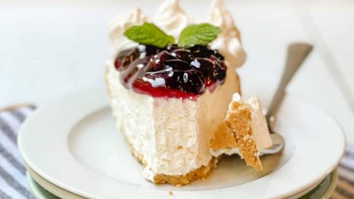 Front view of No Bake Cheesecake with a bite missing